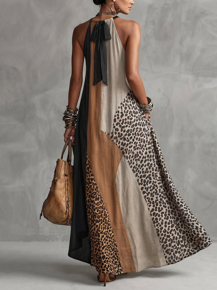 LUCIA | Maxi dress with halter neck, leopard print, and asymmetrical inserts