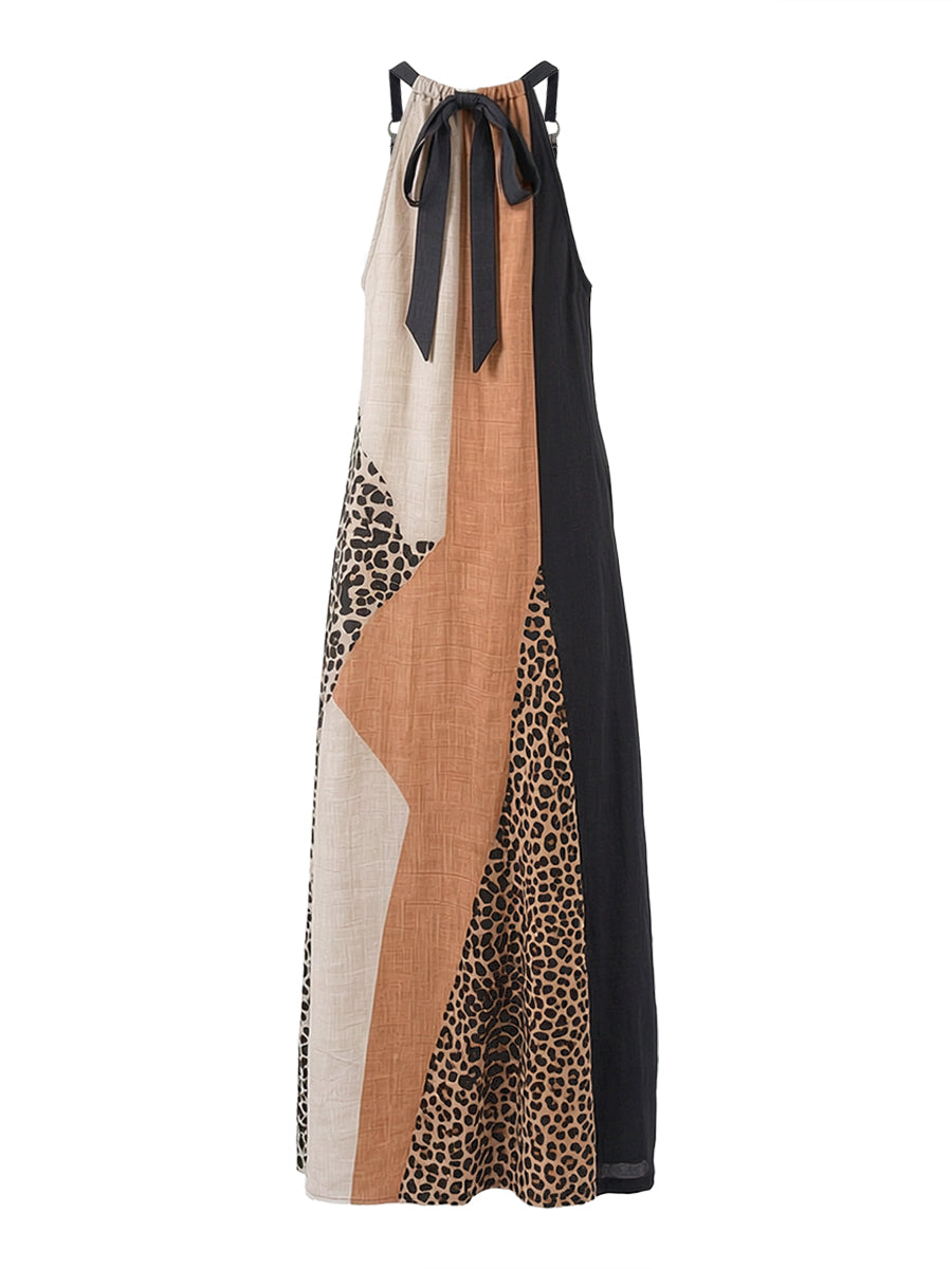 LUCIA | Maxi dress with halter neck, leopard print, and asymmetrical inserts