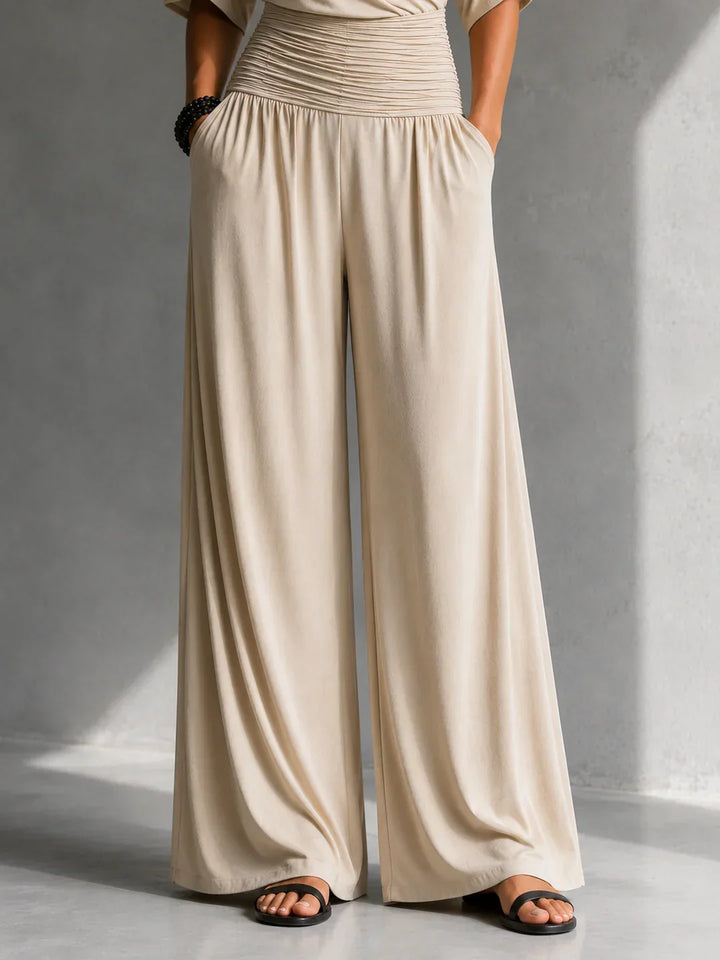 Alia | Elegant jumpsuit with crossover effect and wide leg