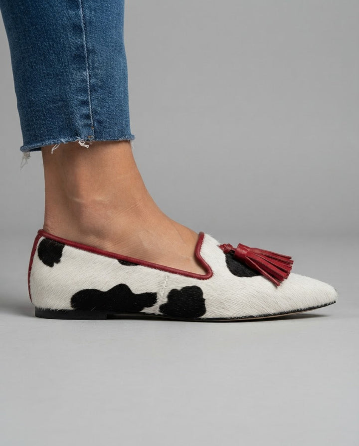 Ginevra |  Black and White Cow Print, Red Tassels Moccasin